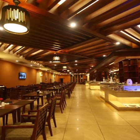 Отель Ramada Plaza Xishuangbanna Экстерьер фото