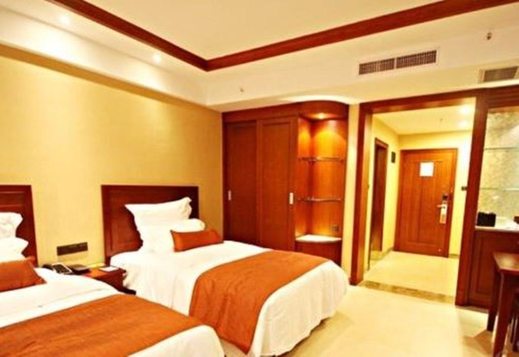 Отель Ramada Plaza Xishuangbanna Экстерьер фото