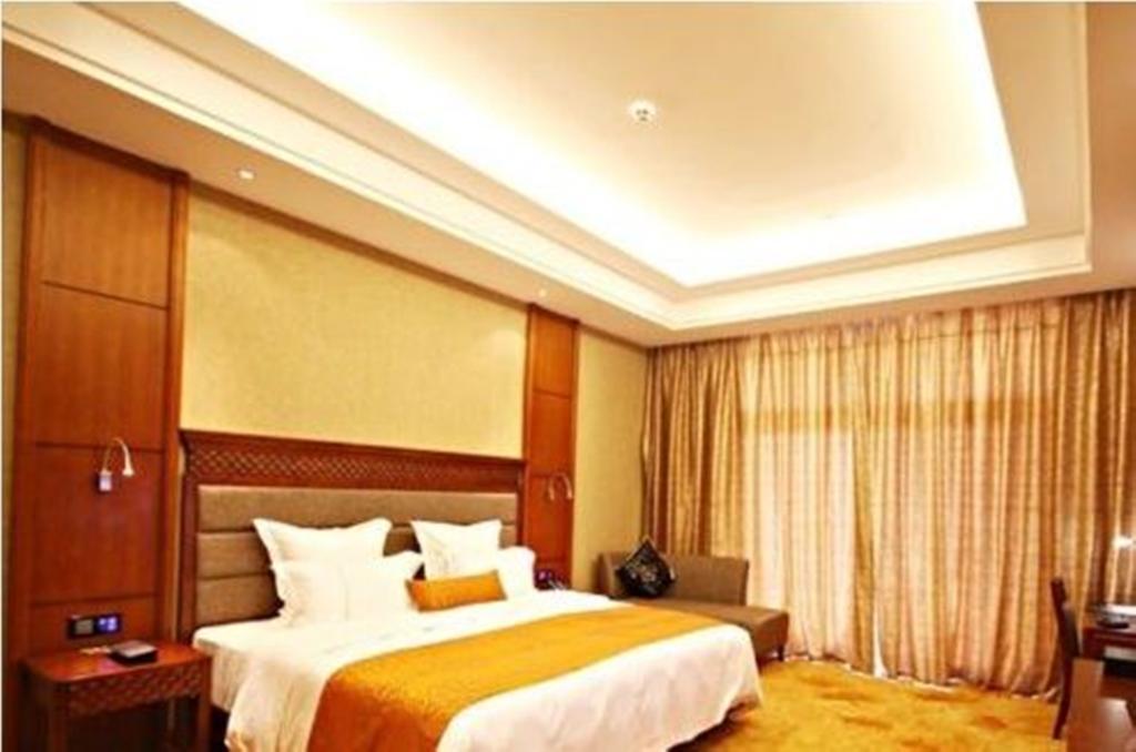 Отель Ramada Plaza Xishuangbanna Экстерьер фото
