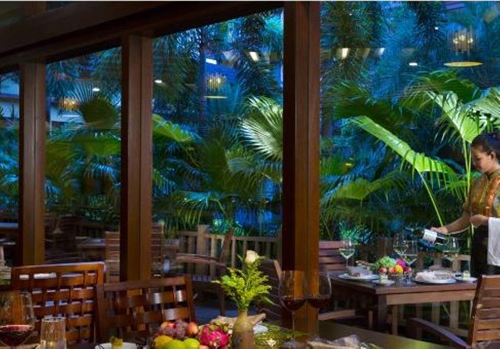 Отель Ramada Plaza Xishuangbanna Экстерьер фото