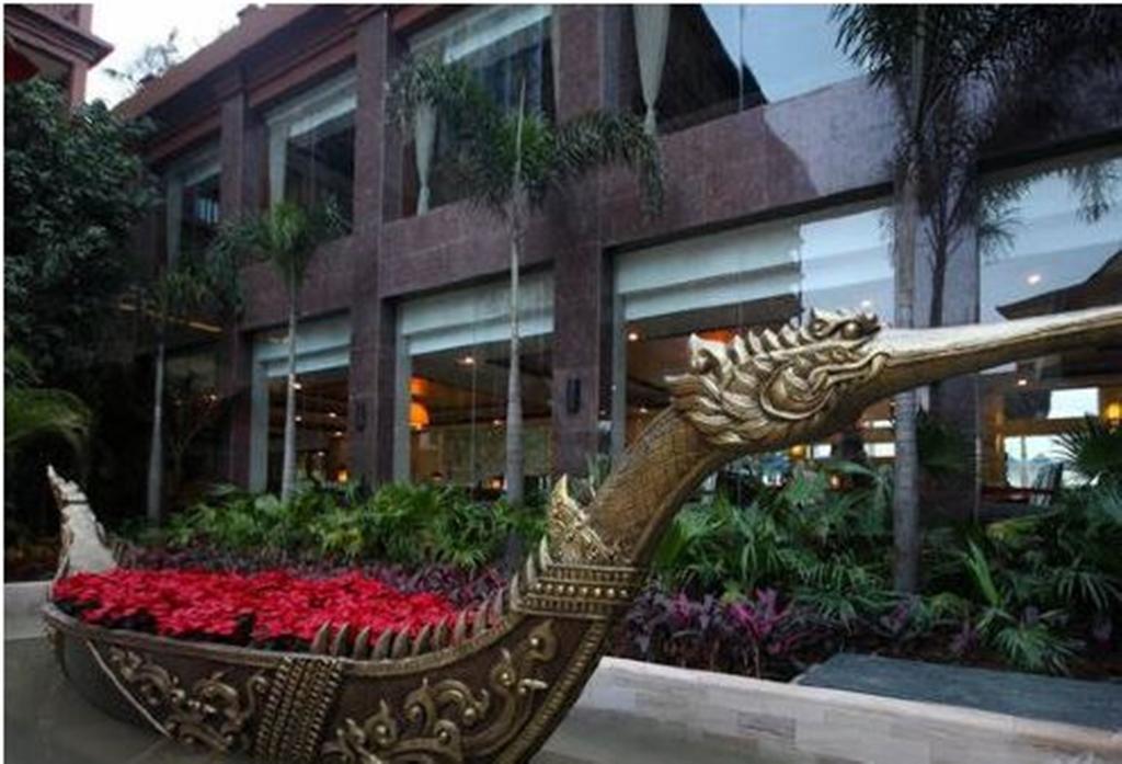 Отель Ramada Plaza Xishuangbanna Экстерьер фото