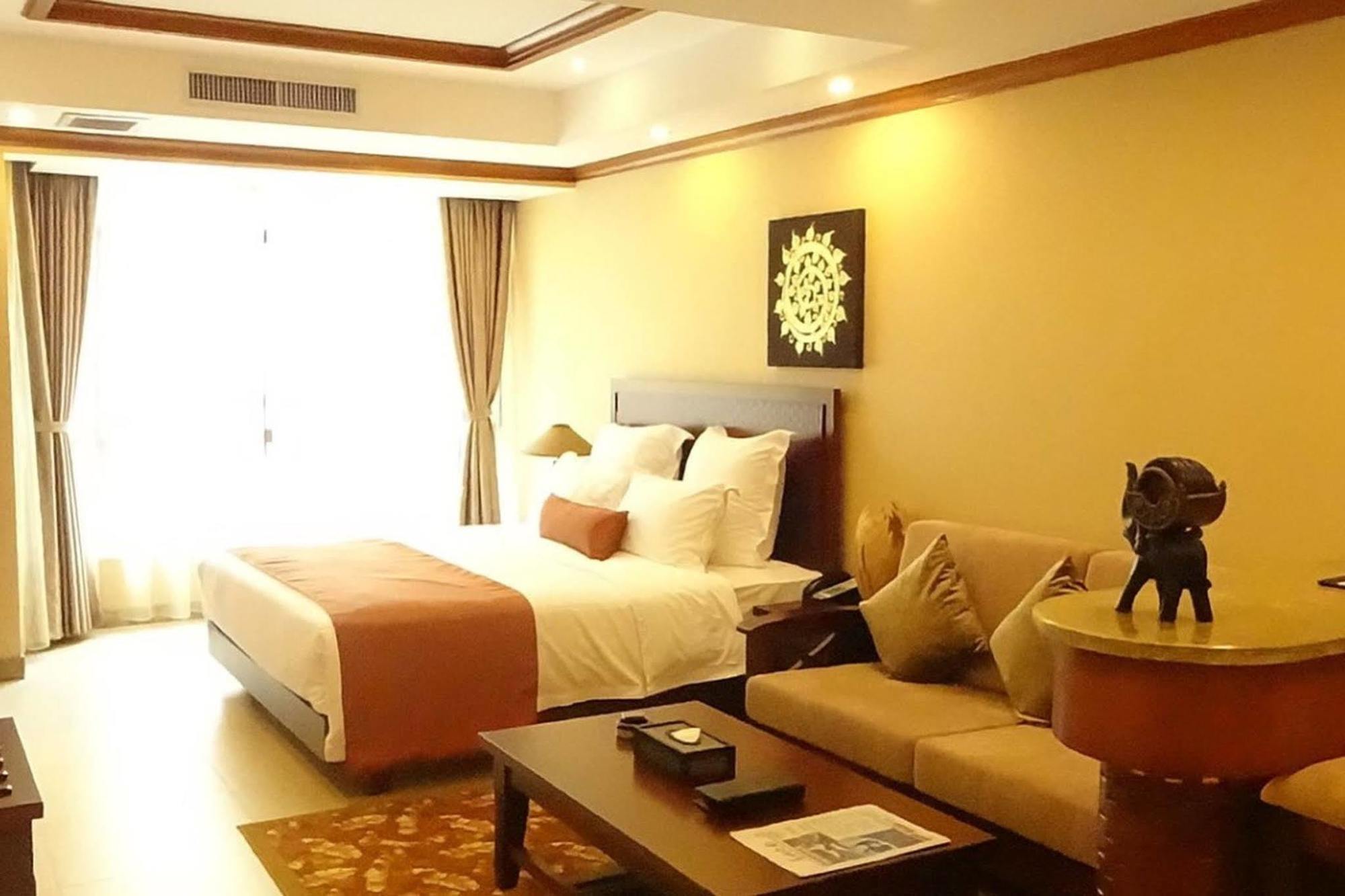 Отель Ramada Plaza Xishuangbanna Экстерьер фото