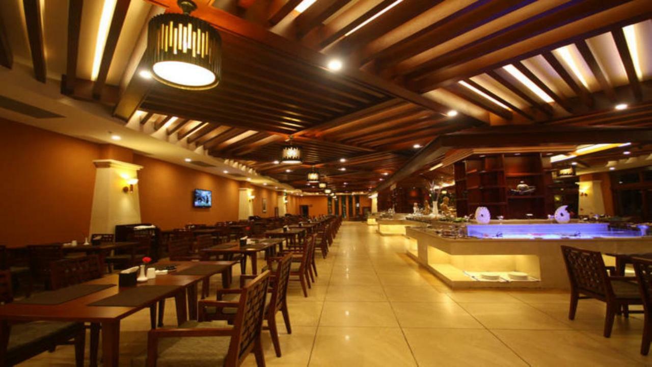 Отель Ramada Plaza Xishuangbanna Экстерьер фото